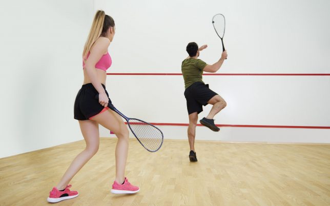 Rear view of couple during the squash game